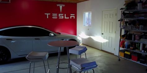 We have seen some pretty cool Tesla-themed garages over the last few year, but this one is a step further. A Tesla Model S owner has renovated his entire garage to make it look just like a Tesla sh… Tesla Garage Ideas, Tesla Garage, Garage Paint, Tesla Car, Garage Floor, Tesla Model S, Garage Design, Tesla Model, Paint Job