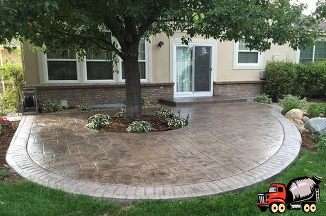 Patio with stamped concrete & tree Front Patio Concrete Ideas, Cement Around Tree, Curved Concrete Patio Shape, Concrete Patio With Step Down, Cement Colors Patio, Concrete Around Tree, Small Stamped Concrete Patio Ideas, Stamped Concrete Fire Pit Area, Pavers Around Tree