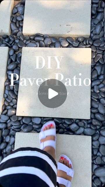 Stephanie Boyer | Interior Decor | Interior Design | DIY on Instagram: "The patio is coming along! I partnered with @loweshomeimprovement to transform my boring backyard. Comment links for a list of all the products I used to build the patio! Stay tuned to see the nexts steps✨✨

The pavers are linked in my bio #affiliatelink #lowespartner #lowesfinds #diy #patio #diyprojects #diypatio #pavers #paverstone #lowes #outdoorproject #patiodesign" Loose Stone Patio Ideas, Cheap Concrete Patio Ideas, Diy Pavers Over Concrete Patio, Concrete Block Patio Ideas, Rock And Paver Patio Ideas, Cement Paver Patio Ideas, Paint Pavers Patio, Cement Patio Ideas Diy, Backyard Gravel Fire Pit Ideas