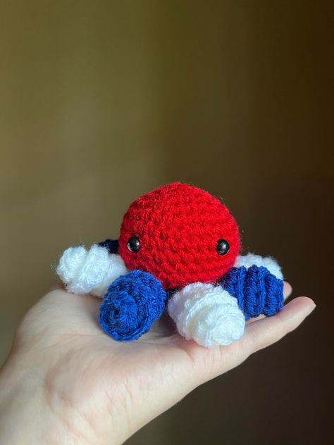 crochet patriotic red white and blue mini amigurumi octops toy, fourth of july, independence day, america, american, usa Crocheted Fourth Of July, 4th Of July Crochet Patterns, Fourth Of July Crochet Patterns Free, Crochet Fourth Of July, Fourth Of July Crochet, Red White And Blue Crochet, 4th Of July Crochet, Patriotic Crochet, Octopus Toy