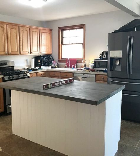 When we bought our first home our kitchen looked like this.. Needless to say that we needed it to be a bit more modern, but also we definitely needed more cabinet space.We had a Home Depot cabinet consultant come over to give us a quote and it was about $1500 for a few updates and an island so... hmmmm. No!We started the process of looking at islands made out of kitchen cabinets and didn’t find much, we got some old cabinets from Facebook marketplace. We had trouble leveling them s… Home Depot Cabinets, Diy Island, Builder Grade Kitchen, Cabinet Trim, Diy Storage Bench, Diy Storage Rack, Rustic Kitchen Island, Counter Seating, Stock Cabinets