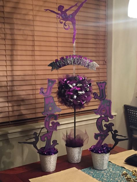 Dance team table decorations using my cricut machine. Dance Team Table Decorations, Dance Team Decorations, Dance Banquet Centerpieces, Dance Centerpieces, Poms Dance, Cheer Snacks, Athletic Banquet, Dance Decor, Cheerleading Party