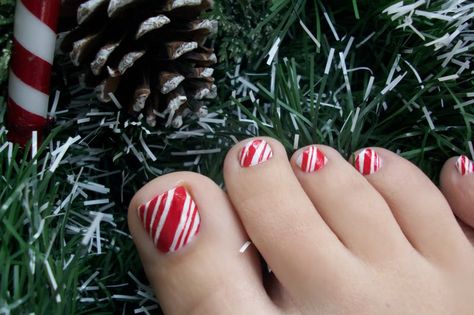 Candy cane toenails!                                                                                                                                                                                 More Candy Cane Toenails, Candy Cane Pedicure, Candy Cane Toes Nails, Holiday Toe Nails Christmas, Christmas Toenail Designs, Christmas Toe Nail Designs Toenails, Pedicure Ideas Winter Toenails, Pedicure Christmas, Christmas Pedicure Ideas Toes