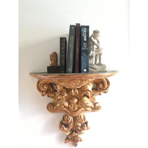 This Spanish Wall Sconce is a beautiful decorative piece that can hold anything from a plant to a statue, or even a candle. It is the equivalent to a floating shelf, except it too is just as beautiful on its own, and can only accent what precious items it holds.   This piece is carved out of alder wood and then water gilded.  There currently are two available in 22k gold.  The piece measures 20" at the base by 17" long. Candle Scones, Pineapple Candles, Candle Plant, Eclectic Living, Eclectic Living Room, Alder Wood, Bedroom House, Shelf Styling, Gold Walls