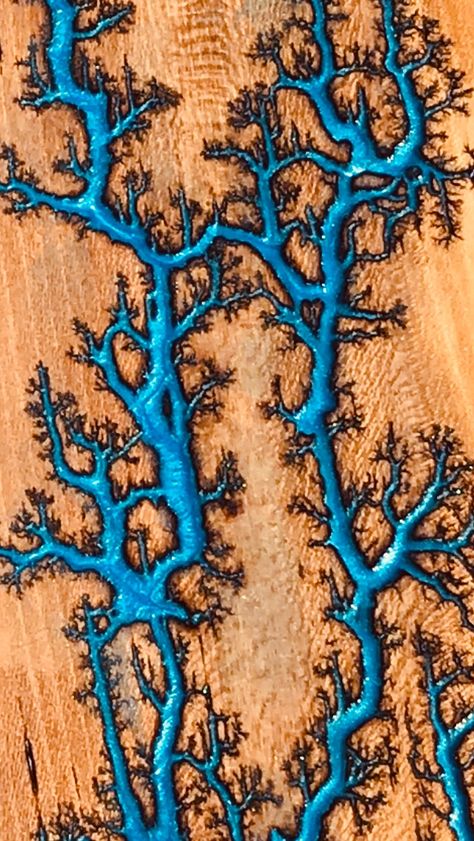 Fractal burned board with blue epoxy inlay Fractal Wood Burn, Fractal Burning Art, Lichtenberg Wood Burning Machine, Wood Burning Diy, Burning Wood With Electricity, Fractal Wood, Fractal Burning, Epoxy Inlay, Wood Wall Art Diy