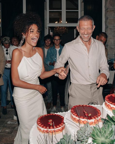 Image may contain: 5 people, people standing and food Tina Kunakey Wedding, Celebrity Wedding Gowns, Perfect Wedding Cake, Tina Kunakey, Interracial Wedding, Vincent Cassel, Celebrity Wedding Dresses, Interracial Love, Interracial Couples