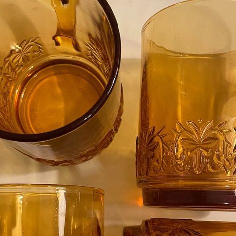 Classy Junk Only on Instagram: "Set of 4 Vintage King Indonesia Amber Glasses with Pressed Design and Handles -circa 1970s - pressed ornate pattern along the bottom -measure almost 4" tall and about 3" across top -in good vintage condition -no chips or cracks $16 +shipping To claim/purchase please comment SOLD Note: As is expected with vintage items, there may be some signs of wear. I do my best to describe each and every item as accurately as possible. Due to the nature of the items, items are final sale. #vintageglassvase #amberglass #amberglassware #vintagemugs #vintagekitchen #amber #shopclassyjunk #shopclassyjunkavailable #kingindonesia" Amber Glassware, Amber Glass, Vintage Kitchen, Amber, 1970s, Glass Vase, Indonesia, Vintage Items, Conditioner