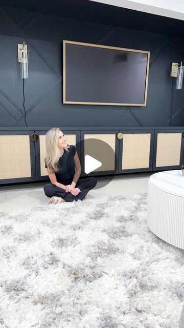 Lauren Jansen | DIY on Instagram: "Quick TV wall makeover in our movie room and wow did these changes make such a difference!

I removed what was here before and assembled 3 IKEA Besta cabinets. I wanted them to be floating so I added braces to the wall studs and secured the cabinets over top!

I used outlet extenders to pull all the outlets through the cabients so all cords would be hidden 🙌 then painted more of this wall so it would have more dimension. Color: tricorn black by SW in eggshell.

I added the most beautiful @norseinteriors Cane Doors in Charcoal with their Cornelia Brass Pulls and 😍

These doors are custom made FOR IKEA PIECES and the install is seamless. I added a wooden countertop that I painted tricorn black by SW to make the 3 cabinets look like one piece.

Annnnnd I d Tv Wall Makeover, Ikea Pieces, Hidden Tv Cabinet, Ikea Besta Cabinet, Cane Doors, Tricorn Black, Wall Makeover, Outlet Extender, Hidden Tv