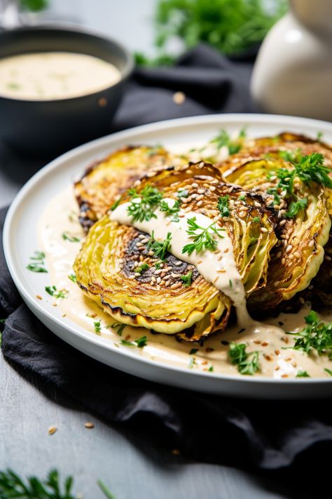 Easy Keto Recipe: Grilled Cabbage Steaks with Tahini Dressing for Healthy Living #ketodiet #ketorecipes #lowcarb Cabbage Steaks Grilled, Cabbage Tahini, Grilled Cabbage Steaks, Cabbage Steak, Spring Dinners, Roasted Cabbage Steaks, Grilled Cabbage, Steak In Oven, Baked Cabbage