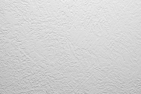 There are 7 types of textured wall ideas you can try for your own house. Learn about these styles and how to create textured walls yourself. | 7 Types of Wall Texture and the Techniques Behind Them Types Of Wall Finishes, Different Types Of Wall Texture, Spanish Lace Walls Texture, How To Texture Wall, How To Create Textured Walls, Sheetrock Texture Styles, Light Textured Walls, Drywall Texture Types Of, Modern Drywall Texture