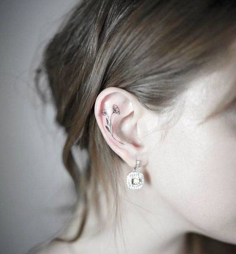 Tiny flower tattoo on the right ear. Cartilage Tattoo, Inner Ear Tattoo, Tiny Flower Tattoos, Flower Spine Tattoos, Flower Tattoo Drawings, Small Flower Tattoos, Simple Tattoo Designs, Dainty Tattoos, Small Tattoo Designs