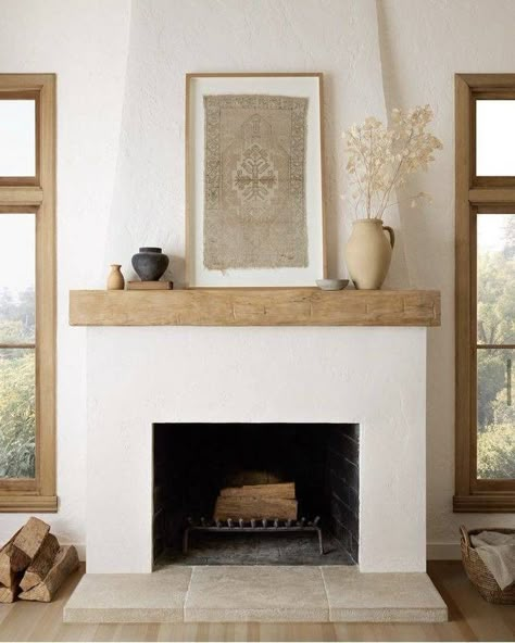 Keep It Cozy With These 15 Stunning Stucco Fireplace Ideas  - Curbly Modern Chimney Ideas Fireplace Wall, Chimneys Ideas Living Room, Fireplace Raised Off Floor, Plaster Wall Fireplace, Interior Design Fireplace Living Room, In Wall Fireplace Ideas, Closed Fireplace Ideas, Diy Indoor Fireplace, Modern Fireplace Design Ideas