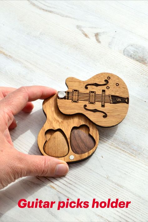 Wooden guitar picks in case will be a great gift for Christmas, New Year, Anniversary gift, Valentine's Day, Fathers Day gift, birthday gift and as a gift for an anniversary, or just a gift as a sign of attention to a guitar player, dad, friend, boyfriend. You can come up with many different options for whom and for what reason you can give this personalized box with guitar picks and it will be an unforgettable gift! Guitar Holder, Guitar Pick Case, Guitar Pick Holder, Guitar Picks Personalized, Wooden Guitar, Pick Holder, Guitar Gifts, Custom Guitar, Guitar Picks