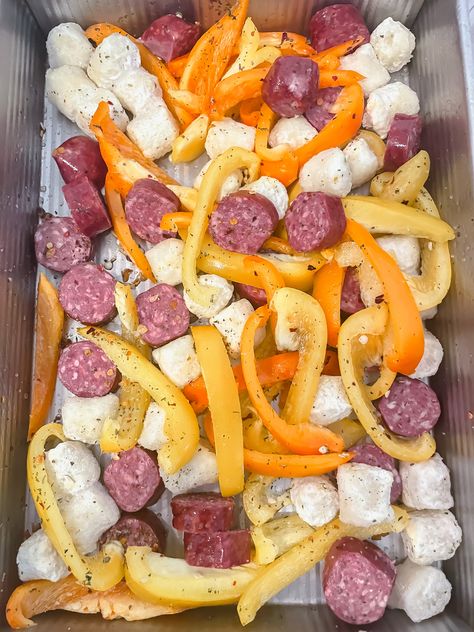 Sheet-pan Sausage, Peppers and Trader Joe's Cauliflower Gnocchi Sheet Pan Cauliflower Gnocchi, Sheet Pan Sausage, Pan Sausage, Cauliflower Gnocchi, Sausage Dinner, Sausage Peppers, Cheddar Chicken, Trader Joes Recipes, Stuffed Mini Peppers