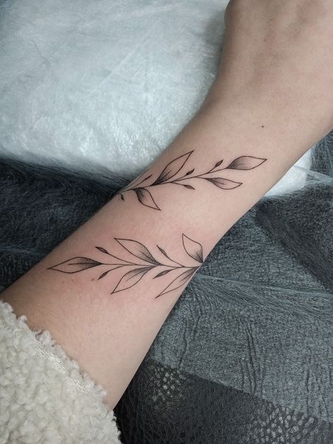 Leaf Tattoo Forearm, Leaf Band Tattoo, Leaf Bracelet Tattoo, Olive Branch Tattoo Arm Wrap, Olive Leaf Tattoo, Wrap Around Wrist Tattoos, Band Tattoos For Men, Half Sleeve Tattoos Forearm, Wrap Around Tattoo