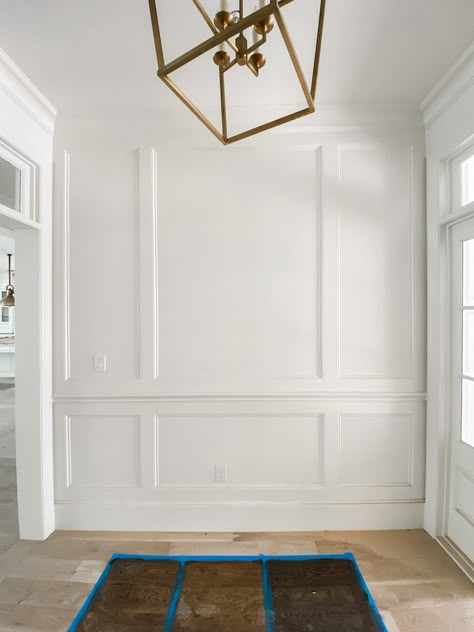 Entry With Wainscotting, Wainscoting In Entryway, Picture Molding Accent Wall, Wanescotting Entry Way, Foyer Trim Ideas Entryway, Entryway Molding Ideas, Foyer Wainscoting Entryway, Entry Molding, Entryway Paneling