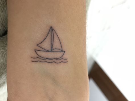 #tattoo #travel #boat #minimalist #style #feminine #girlwithtattoos Small Sailboat Tattoo Simple, Small Boat Tattoo Simple, Simple Boat Tattoo, Sailboat Tattoo Simple, Sail Boat Tattoo, Boat Tattoos, Small Henna Tattoos, Sailboat Tattoo, Boat Tattoo