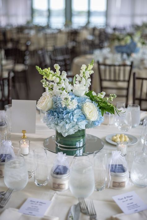 Wedding Center Table Decor, Centerpieces With Blue Flowers, Simple Blue Wedding Centerpieces, Centerpieces Blue And White, Light Blue And White Party Decorations, Dusty Blue And White Centerpieces, Blue And White Floral Centerpieces Wedding, Blue Wedding Table Centerpieces, Dusty Blue Centerpieces Wedding Simple