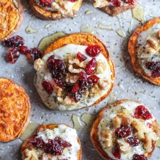 Sweet Potato Rounds with Herbed Goat Cheese, Roasted Walnuts, Cranberries, and Honey | TheRoastedRoot.net an easy and healthy appetizer! #recipe #glutenfree #healthy #holiday Healthy Holiday Appetizers, Sweet Potato Rounds, Herbed Ricotta, Potato Rounds, Sweet Potato Slices, Roasted Walnuts, Healthy Appetizer Recipes, Healthy Holiday Recipes, Rosh Hashanah