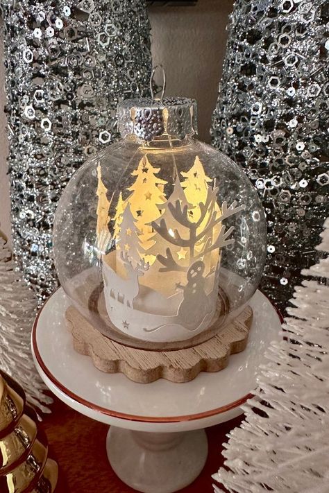 Paper Christmas Lanterns, Christmas Paper Lanterns Diy, Luminaries Christmas, Paper Lanterns Cricut, Cricut Luminaries, Cricut Paper Lantern Projects, Christmas Paper Lanterns, Christmas Lantern Svg Free, Christmas Lantern Decor Ideas