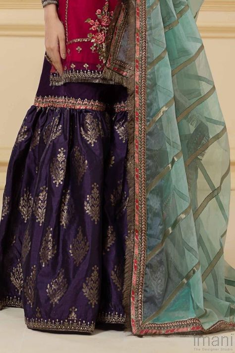 3 Pieces Outfit (Shirt, gharara and Dupatta) Organza Straight shirt intricately embroidered and hand embellished. Paired with Beautiful Purple jamawar Gharara with embroidered patti at knee and Hemline and contrast Light Turquoise colourTie&dye Organza Dupatta with embroidered patti & Fringe on all 4 sides. Purple Gharara, Pink Purple Outfit, Jamawar Gharara, Green Gharara, Gharara Designs, Desi Fits, Desi Dress, Purple Outfit, Mehendi Outfits