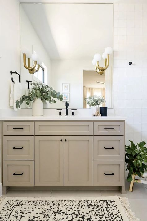 Ways To Make A Small Bathroom Feel Bigger – Forbes Home Transitional Small Bathroom, Small Bathroom Feel Bigger, Small Bathroom Look Bigger, Small Bathroom Sinks, White Wall Tiles, Regents Park, Transitional Bathroom, Bathroom Sconces, Bathroom Remodel Designs