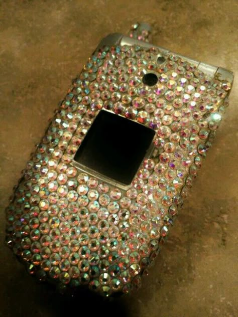 Vintage glam swarovsky crystal flip phone, circa 2004 via Darnell Sue. Hand applied crystals. Took about 8 hours. Sparkly Flip Phone, Bling Flip Phone, Bedazzled Flip Phone Aesthetic, Y2k Flip Phone Aesthetic, 2000s Phone Aesthetic, Flip Phone 2000s Aesthetic, Bedazzled Flip Phone, Flip Phone 2000s, Trap Phone