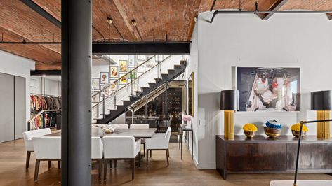 Bella Hadid Lists NYC Duplex for $6.5 Million | Architectural Digest Soho Penthouse, New York City Penthouse, Bicycle Room, Manhattan Penthouse, City Penthouse, Nyc Penthouse, New York Penthouse, Metal Columns, Marble Island