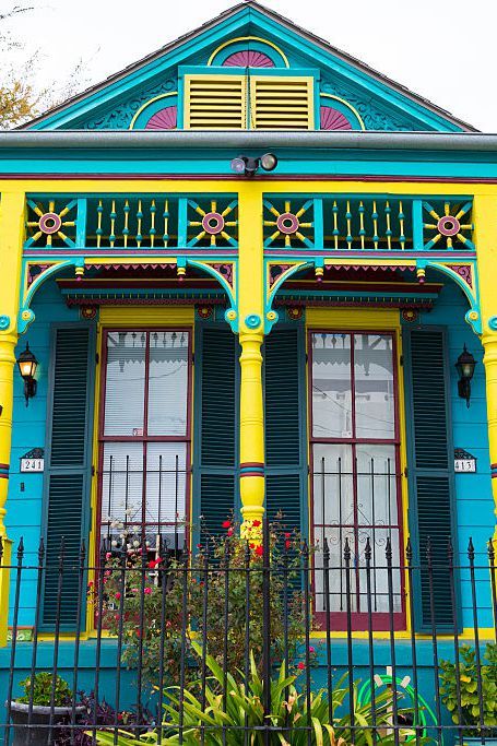 A medley of vibrant shades highlight the Victorian architecture of this Louisiana home. House Color Ideas, Painted Lady House, Shotgun House, Louisiana Homes, Eclectic House, Cottage Exterior, Spanish Style Home, Property Design, Casa Exterior