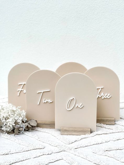 Arch Acrylic Table Numbers | Wedding Table Numbers | Table Numbers – The Humble Gift Co. Arch Shaped Wedding Invitations, Acrylic Arch Table Number, Boho Table Numbers Wedding, Beige Wedding Table, Wedding Signing Table, Arch Table Numbers, Acrylic Table Numbers Wedding, Wedding Table Signage, Acrylic Arch