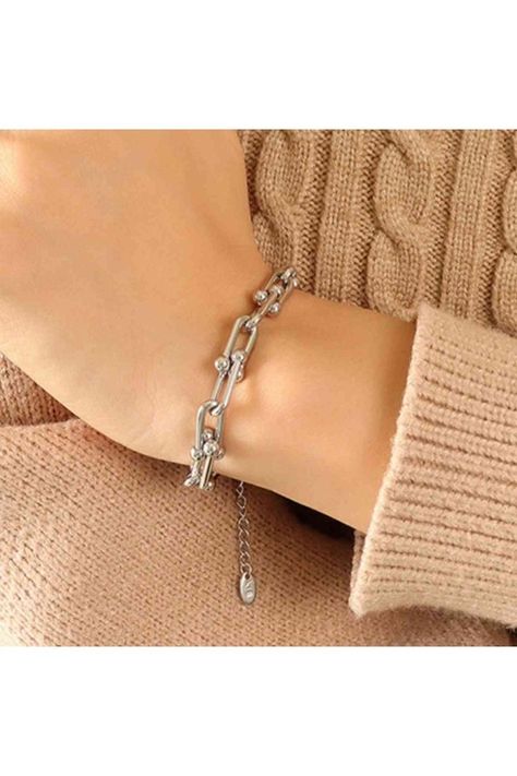 Chunky Chain Titanium Steel Bracelet Enhance your style with our chunky chain titanium steel bracelet. Made with durable and high-quality titanium steel, this bracelet is sure to last for years to come. Elevate your look and exude confidence with this sleek and modern accessory. Perfect... https://fitggins.com/products/chunky-chain-titanium-steel-bracelet FITGGINS #womenfashiononline #fashiontrends #shopthelook #onlineboutique #fashiongoals #trendyessentials #shoptrendy #fashionablefinds #... Modern Accessories, Girls Jewelry, Steel Bracelet, Jewelry Bags, Silver Bracelets, Chain Lengths, Jewelry Collection, Gold Bracelet, Bag Accessories