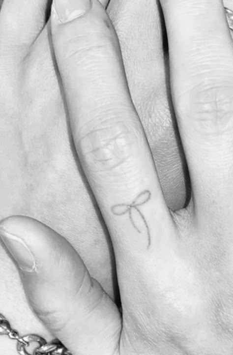 #bow #finger #tattoo Tattoo On Inside Of Finger, Tiny Easy Tattoos Simple, Coquette Finger Tattoos, Bow Finger Tattoos For Women, Minimalist Bow Tattoo, Fairy Finger Tattoo, Bow On Finger Tattoo, Bow Tattoo On Finger, Bow Tattoo Finger