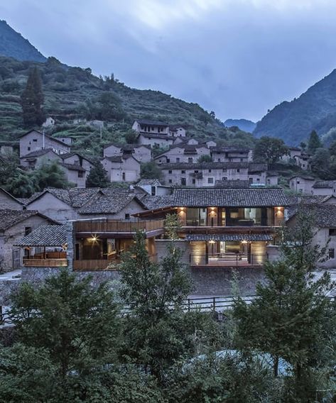 shulin architectural design sets stone + wood hotel within an ancient village in china Masonry Blocks, Nature And Architecture, Green Terrace, Mountain Hotel, China Architecture, Rammed Earth Wall, Hangzhou China, Stone And Wood, Ancient Village