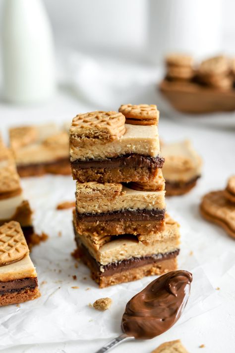 Nutter Butter Bars feature a Nutter Butter cookie crust, a layer of Nutella and a simple but ultra delicious peanut butter cheesecake topping! Butter Cookie Crust, Peanut Butter Nutella Cookies, Cheesecake Topping, Peanut Butter Nutella, Cheesecake Toppings, Nutter Butter Cookies, Nutella Cookies, Butter Bars, Nutter Butter