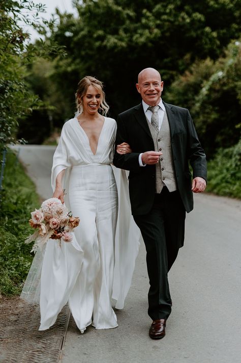 Bride walks with her father on her wedding day | Mark Horton Photos Wedding Jumpsuit With Cape, Father Of The Bride Attire, Jumpsuit With Cape, Mermaid Bride Dresses, Indian Bride Dresses, Father Of The Bride Outfit, Princess Bride Dress, Boho Bride Dress, Men Attire