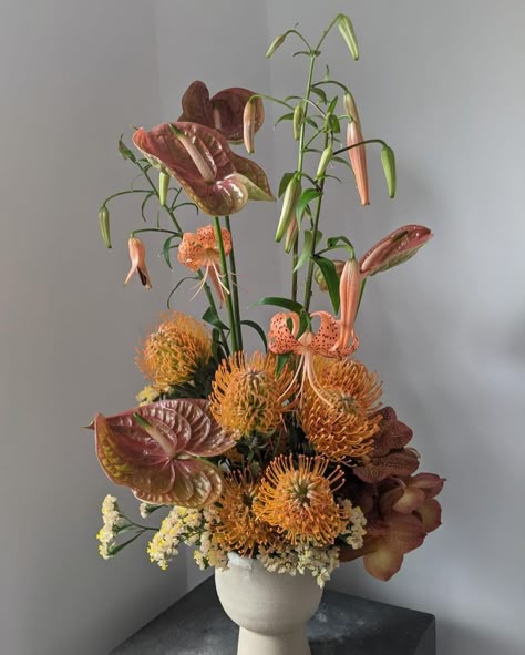 SAGE (@sage.flowers) • Instagram photos and videos Abstract Floral Arrangements, Thanksgiving Arrangements, Sage Centerpiece Floral Arrangements, 70s Style Flower Arrangements, Amber Floral Arrangement, Amber Glass Floral Arrangement, Groovy Floral Arrangements, Flower Flat Lay, Orange Centerpieces