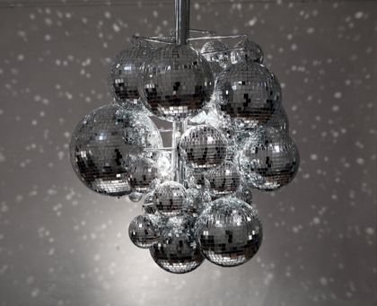 Curbly has a DIY disco ball chandelier for some bling! Disco Homecoming, Disco Ball Chandelier, Disco Ball Lamp, 2023 Apartment, Cool Chandeliers, Disco Ball Light, Dibujos Toy Story, Disco Decorations, Ball Chandelier