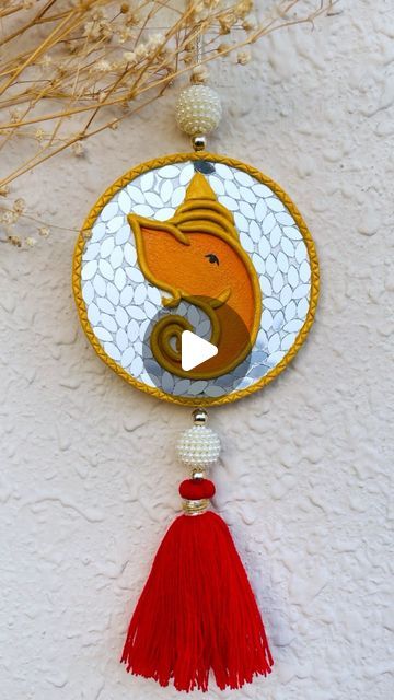 Creazone India on Instagram: "Ganpati Bappa Morya!!

Let Lord Ganesha’s blessings fill your home with this beautiful Ganesha hanging. 

[ganesh chaturthi, gifting, lippan art, handmade]

#ganeshfestival #diy #homedecor #viralreels #handmadegifts #mosaicart #lippanart #ganeshchaturthi #ganeshchaturthidecorations #ganeshachaturthi 2024 #returnfavours #spirituality #sacredgift #ganpatifestival #ganpati_bappa_morya #handmade #lippanartgifts #diwali2024 #festivegifts #handpainted #lippanartist #lippanartworkshop #ganeshutsav #ganpatigifts #mumbai #ganraya #gajanan #siddhivinayak #riddhisiddhi #mirrormosaic" Lippan Art Ganesha, Ganpati Bappa Morya, Ganpati Festival, Ganesh Utsav, Bappa Morya, Lippan Art, Mirror Mosaic, Ganpati Bappa, Ganesh Chaturthi