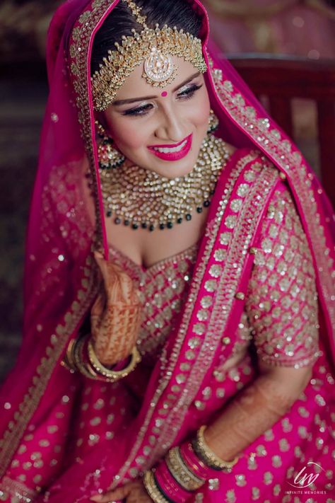 Creative @Suvarnajoshi93 amazing wedding pictures for wedding album ideas images on Designspiration Pink Bridal Lehenga Brides, Pink Lehenga Bridal Makeup, Dark Pink Lehenga Bridal, Dark Pink Bridal Lehenga, Dark Pink Lehenga, Pink Lehenga Bridal, Dark Lip Makeup, Pink Bridal Lehenga, Lehenga Bridal