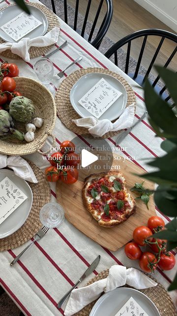 Tableshoppe Co. | Table Decor Bundles and Curated Home Decor on Instagram: "Because tableware is far less expensive than flights to Europe for a family of 6. 🤣💃🏼 Save for later!   Comment “ITALY” and I’ll send you all the links to this night in Italy I set up for my family 🍕 Follow @tableshoppeco to make sure they make it to your inbox 📥   Everything I used for this Italian-inspired pizza tablescape— Red stripe table linen Print at home Pizza party menus  Straw woven bowl Over the table rod from @shopterrain  Faux garland  Rattan chargers  Stoneware plates Knotted Ivory napkins  Beige mini lamps  Pizza peel Vintage style glassware  Tomatoes on the vine, garlic, and artichokes running down the table  Buon appetito! 🤍  #pizzanight #pizzaparty #tablescapes #tablescapestyling #tabledecor Italian Tablescape Ideas, Outdoor Italian Dinner Party, Pizza Party Table Setting, Pizza Party Menu, Italian Table Decorations, Italian Table Setting, Italian Tablescape, Over The Table Rod, Backyard Pizza Party