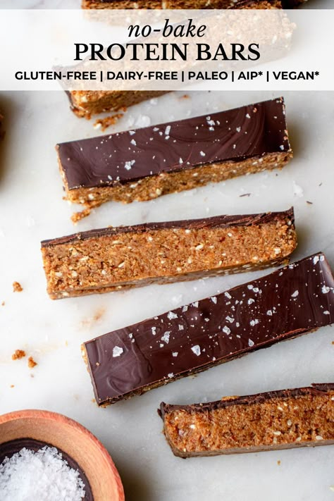 These are the Best Gluten-Free Dairy-Free Protein Bars! They’re soft and fluffy, packed with fiber and protein, and topped with a smooth chocolate coating. These homemade, no-bake paleo protein bars are vegan- and Modified AIP-friendly. They’re the perfect grab-and-go snack or wholesome treat! #proteinbars #glutenfreedairyfreerecipes #glutenfreeproteinbars #dairyfreeproteinbars #paleoproteinbars #nobakeproteinbars #soyfreeproteinbars #veganproteinbars #aipproteinbars #diyproteinbars Rx Protein Bars Homemade, Paleo Protein Bars Homemade, Paleo Protein Bar, Quinoa Protein Bar, Gluten Free Protein Bars Homemade, Vegan Protein Bars Homemade, Aip Protein Snacks, Paleo High Protein Snacks, 20 Gram Protein Bars Homemade