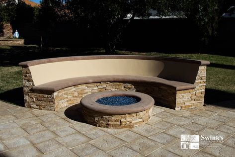 An arc shaped bench was built surrounding the fire pit in this large Simi valley backyard. It makes a great accent piece for the yard with its Premier Honey Wheat Natural stacked stone, stucco back, bullnose “Omaha Tan” colored concrete seat and cap, and light cream colored smooth slanted plaster finish backrest. The fire pit mimics the shape, style, and materials used on the bench and offers a Caribbean Blue reflective fiberglass. Concrete Bench Outdoor, California Garden Design, Cement Bench, Fire Pit Bench, Colored Concrete, Plaster Finish, Concrete Bench, Honey Wheat, Round Fire Pit