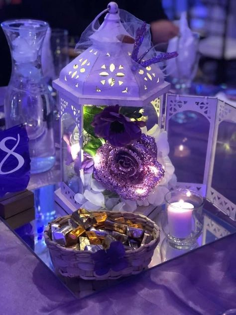 Who Should I Invite To My Sweet 16, Butterfly Theme For Quinceanera, Quince Decorations Flowers And Butterflies, Rapunzel Quinceanera Centerpieces, Purple 15 Ideas, Sweet 16 Tiara Purple, Center Piece For Debut, Purple Fairy Theme Quince, Fairy Garden Quinceanera Theme Purple