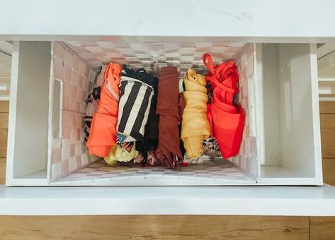 Swimwear Storage Ideas, Wet Swimsuit Storage, Organize Bathing Suits, Organizing Bathing Suits Storage Ideas, Best Way To Store Leggings, Organize Swimwear, Bathing Suit Storage, How To Store Swimwear, How To Store Bathing Suits