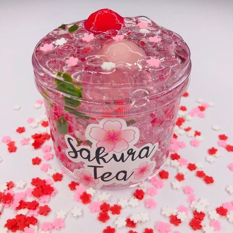 Sakura Tea Fishbowl Slime Clear slime fishbowl slime #gadget Sakura Tea, Cherry Blossom Tea, Slime Package, Slime Games, Pretty Slime, Jelly Slime, Slimy Slime, Glossy Slime, Flower Clay