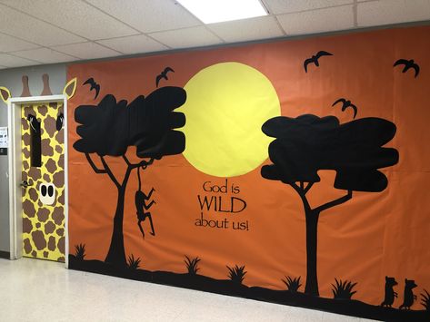 VBS into the wild wall and door Jungle Animals Preschool, Safari Theme Classroom, African Safari Theme, Jungle Crafts, Stall Decorations, Vacation Bible School Themes, Daycare Themes, Giraffe Birthday, Paper Mache Animals