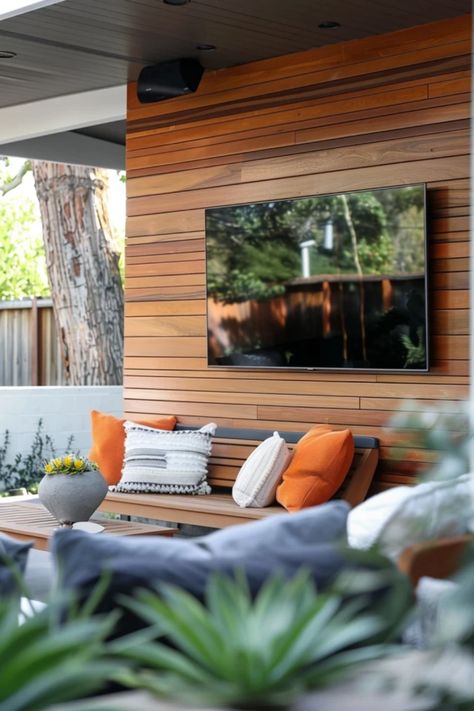 Ready to make your backyard the ultimate entertainment space? Discover stylish outdoor TV wall ideas that will turn heads! Imagine hanging that big screen under the stars, creating the perfect setup for movie nights, sports events, and cozy gatherings with friends. From wooden panels to sleek designs, we have innovative ways to incorporate a TV wall into your outdoor living area. Boost your backyard style while enjoying your favorite films in a relaxed setting. Your neighbors will be ready to join the fun! Outdoor Tv Setup Patio, Outdoor Tv Wall Ideas, Outdoor Tv Wall, Outdoor Tv Screen, Outdoor Tv Ideas, Outdoor Tv Setup, Outdoor Tvs, Functional Backyard, Small Urban Garden