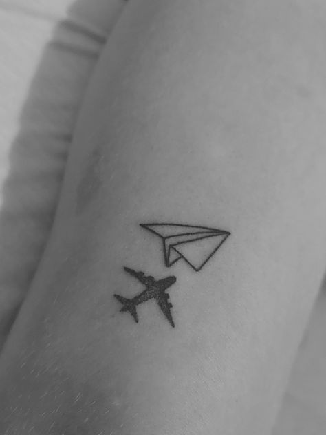 Single Line Travel Tattoo, Simple Airplane Tattoo, Aerospace Tattoo, Pilot Tattoo Ideas, Airplane Tattoo Men, Aeroplane Tattoo, Paper Airplane Tattoo, Reflection Tattoo, Paper Airplane Tattoos