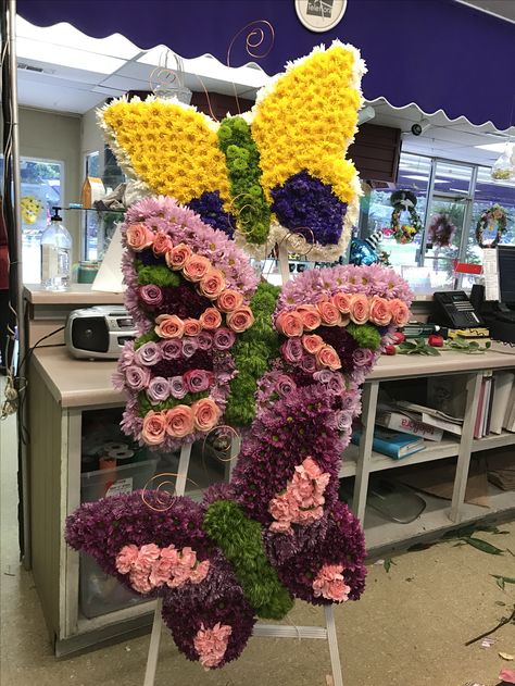 Floral Butterflies Amy's Florist,Tuscaloosa Al. Easter Cemetery Decorations, Butterfly Floral Arrangements, Butterfly Flower Arrangement, Oasis Floral Foam Shapes, Butterfly Wedding Theme, Easter Flower Arrangements, Large Flower Arrangements, Cemetery Decorations, Creative Flower Arrangements