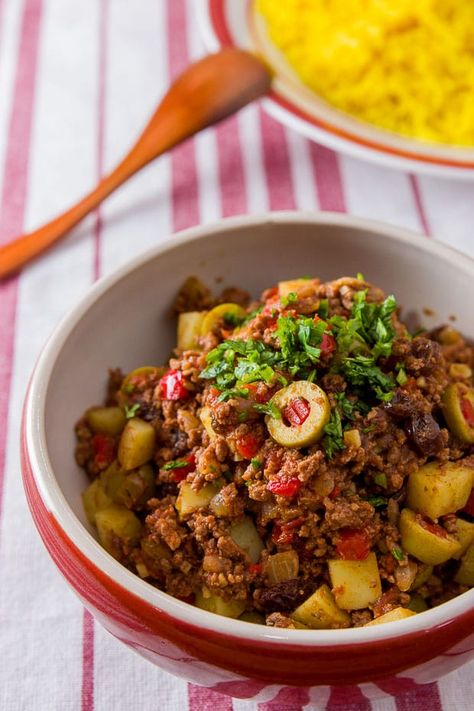 Picadillo (Cuban-Style) I Originally a Spanish dish, the recipe made its way to all of Spain's colonies I Made with beef, cumin and cinnamon. Spanish Dish, Cuban Picadillo, Xmas Menu, Picadillo Recipe, Cuban Dishes, Cuban Cuisine, Cuban Style, Yummy Dishes, Cuban Food